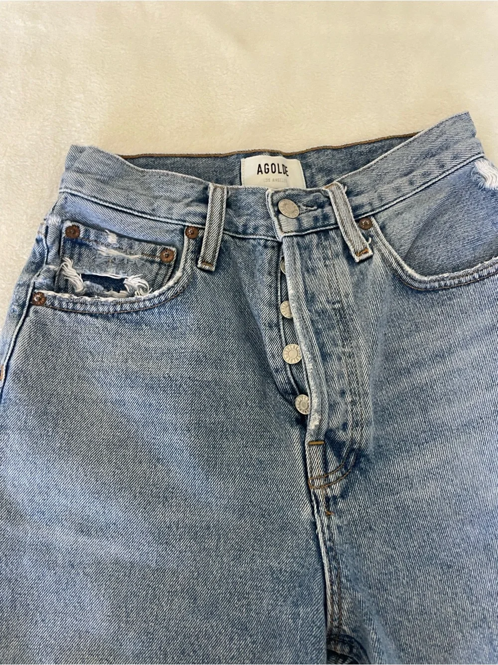 Agolde Riley Light Blue High-Rise Frayed Hem Cutoff Denim Shorts